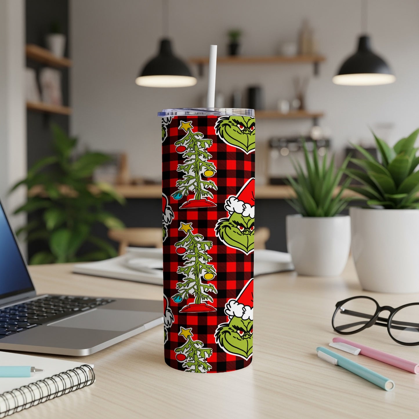 Green Grinch pattern with Christmas trees and red buffalo plaid on a tumbler.