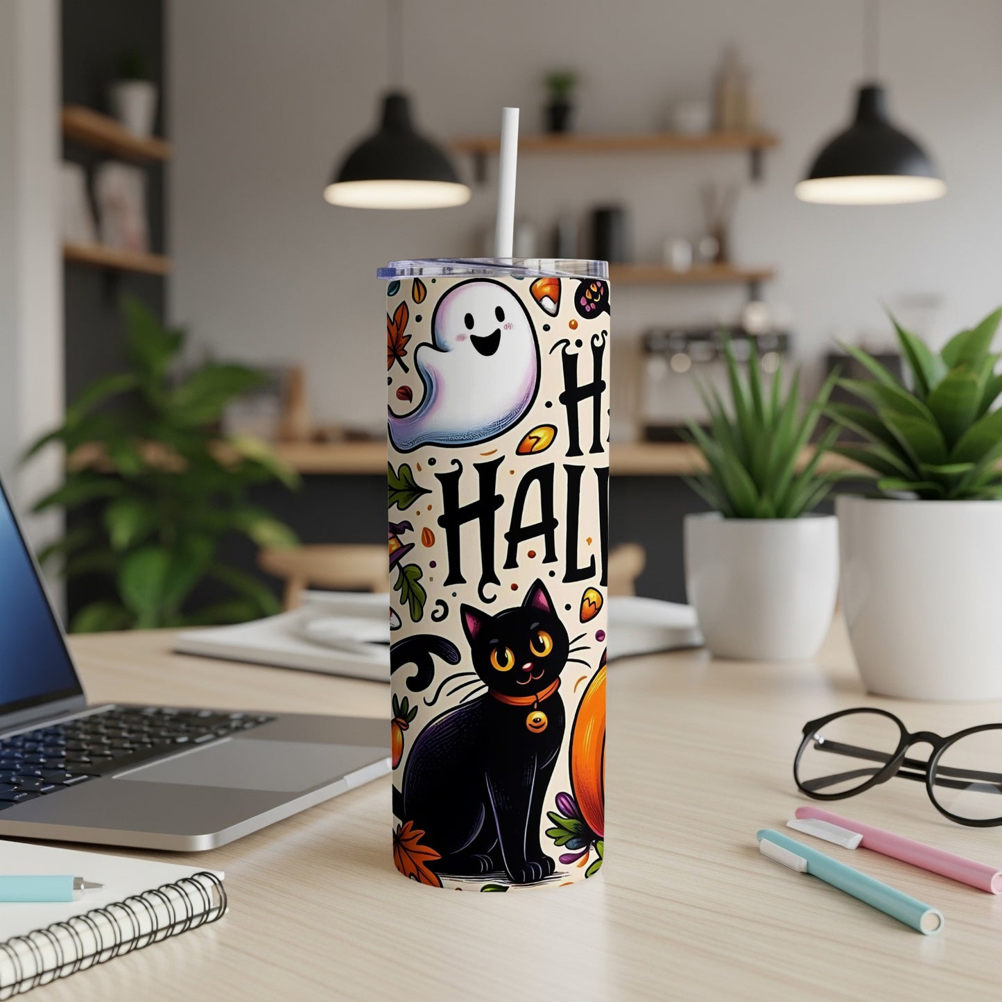 Halloween tumbler with black cat, ghost, leaves, and candy corn pattern.