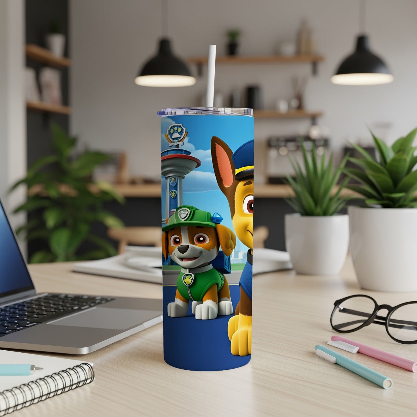 Paw Patrol Chase and Marshall characters on a blue insulated tumbler.