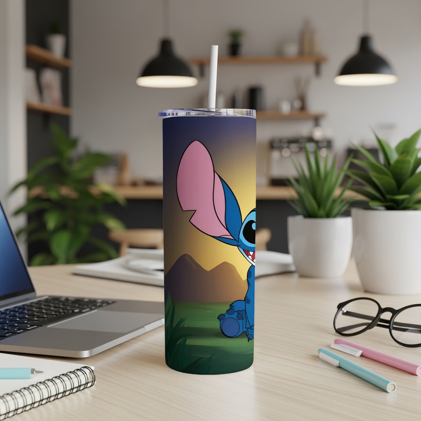 Disney's Stitch character on a colorful tumbler with straw.