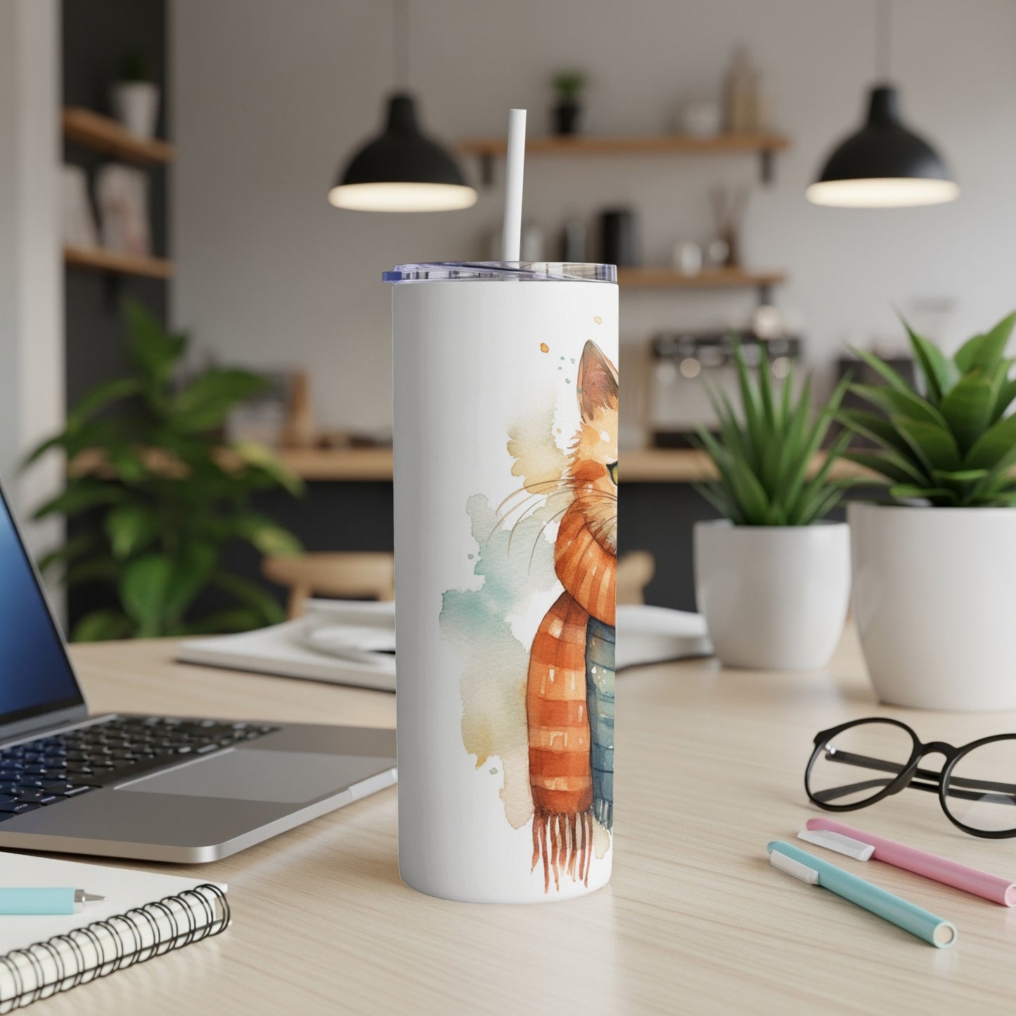 White tumbler with watercolor cat wearing an orange scarf.