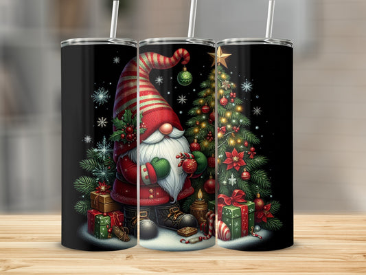 Christmas gnome with gifts and decorated tree on a black tumbler.