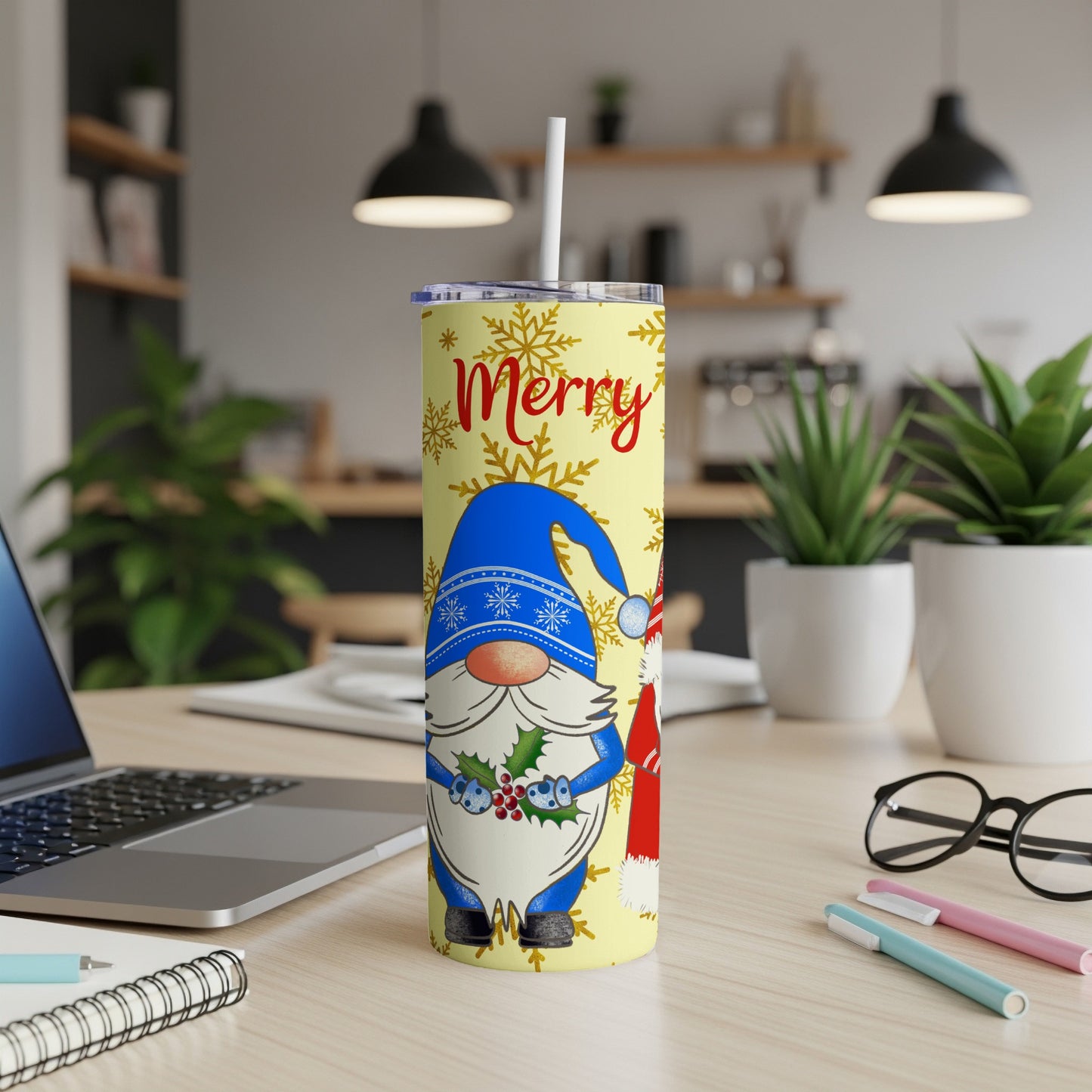 Yellow tumbler with gnome, snowflakes, and "Merry" text.