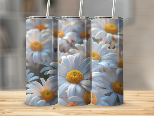 Three tumblers featuring a close-up pattern of white daisies with yellow centers.