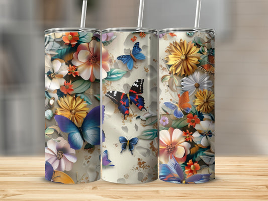 Three tumblers with floral and butterfly designs.
