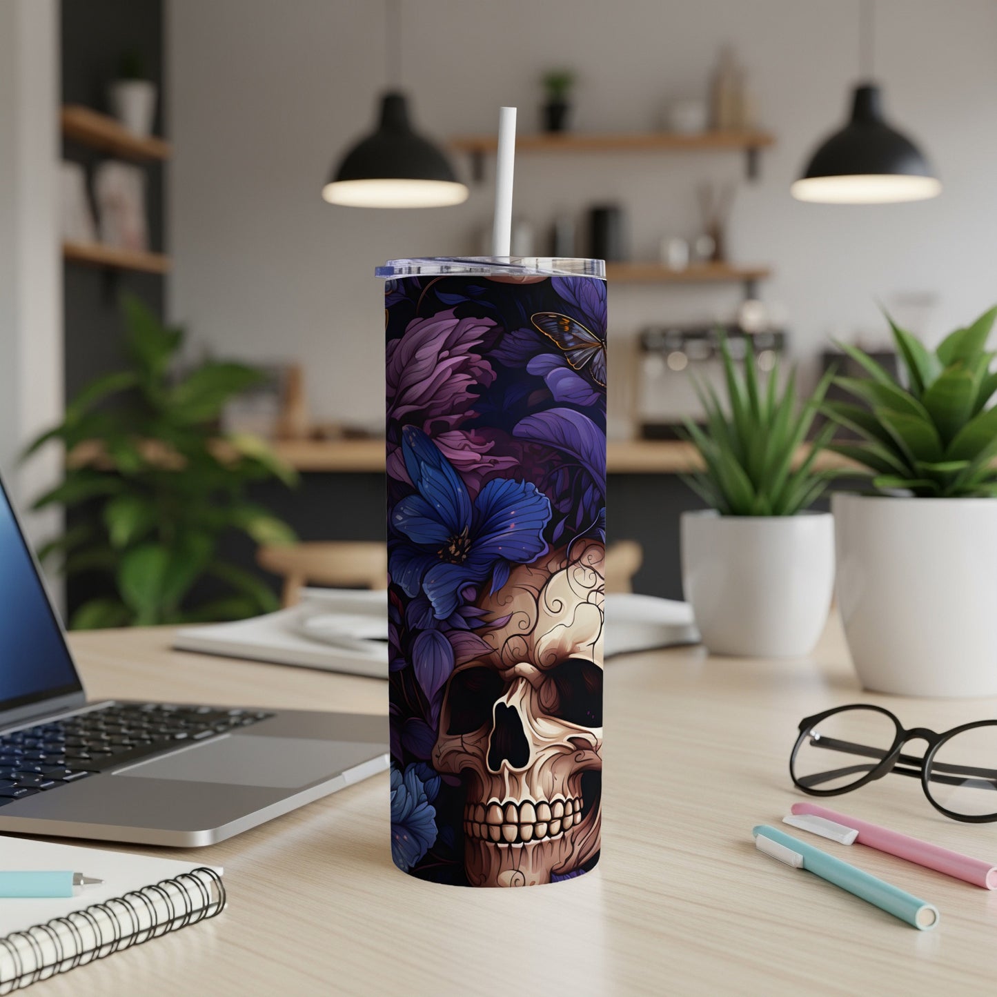 Tall tumbler with a skull and dark floral design, featuring a butterfly.