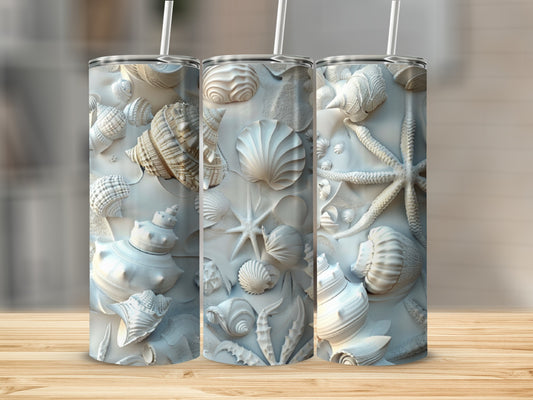 Three tall tumblers with embossed seashell and starfish patterns.