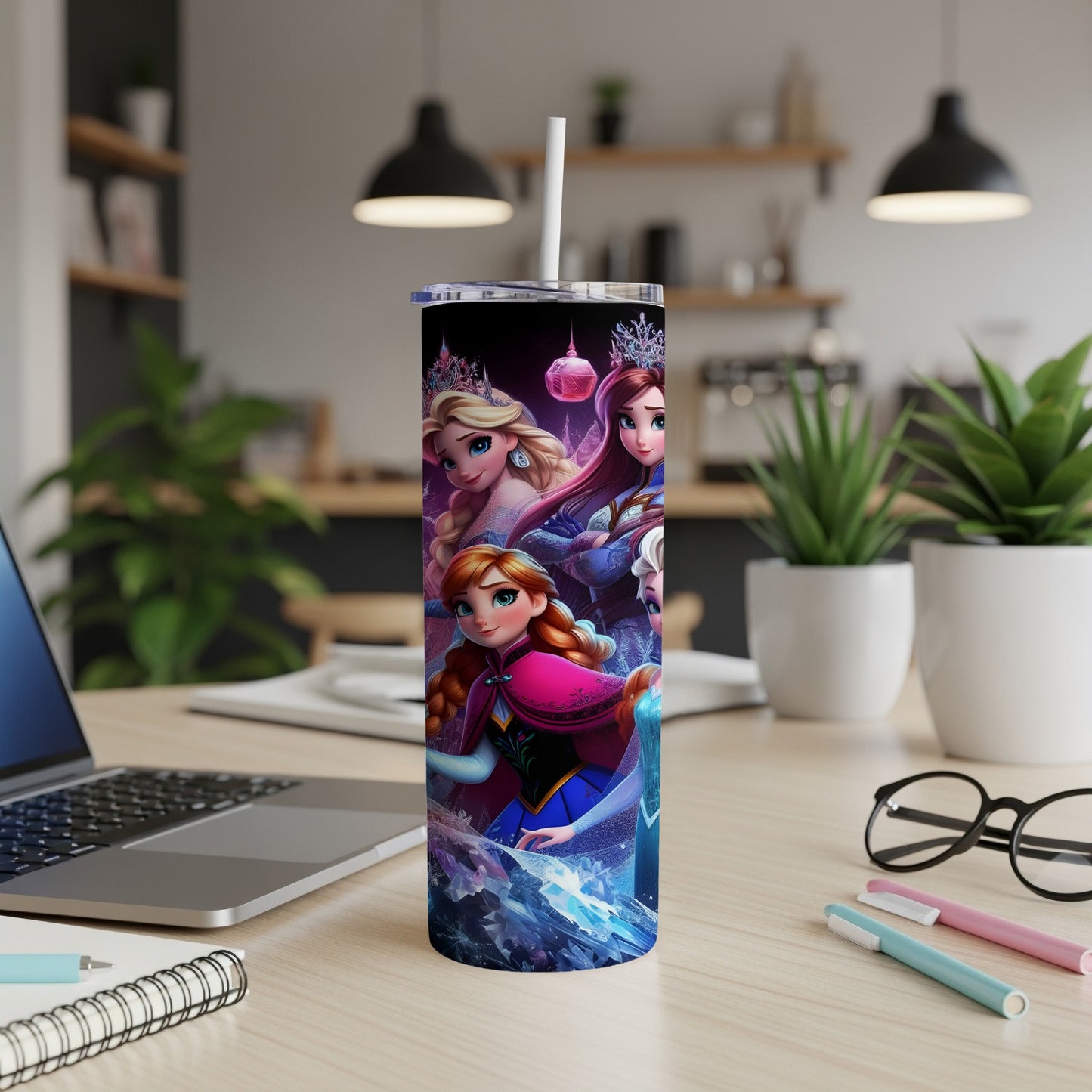 Elsa and Anna from Frozen on a skinny tumbler with a white straw.