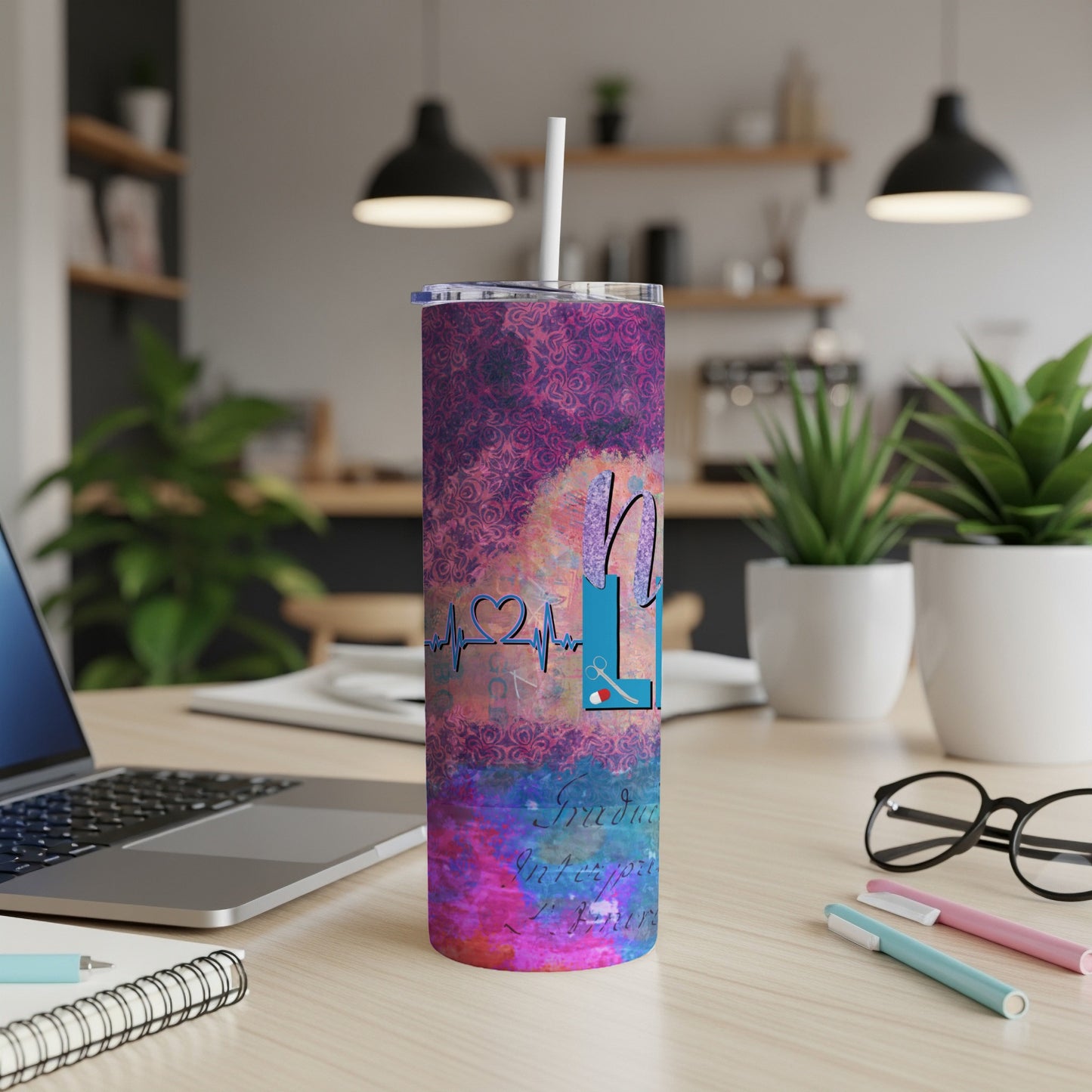 Tumbler with "Graduate Interpreter" text and a heart monitor design.