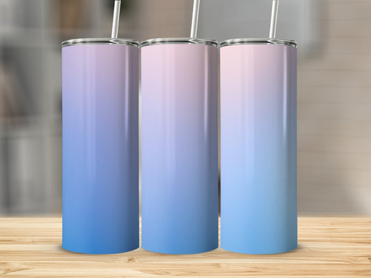 Three tall tumblers with blue and pink gradient, on wooden surface.