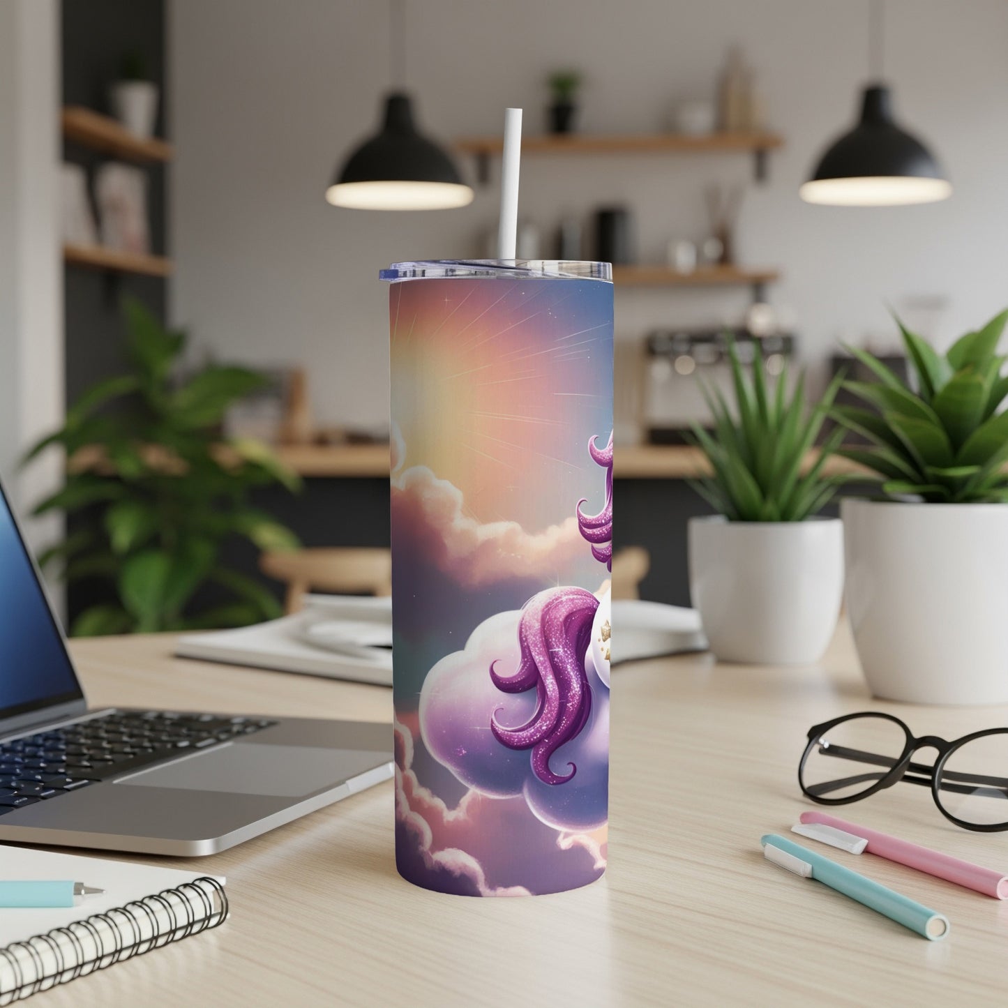Unicorn on clouds design on a white tumbler with a straw.