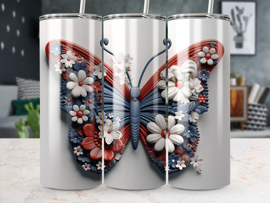White tumbler with a patriotic butterfly design featuring red, white, and blue flowers.