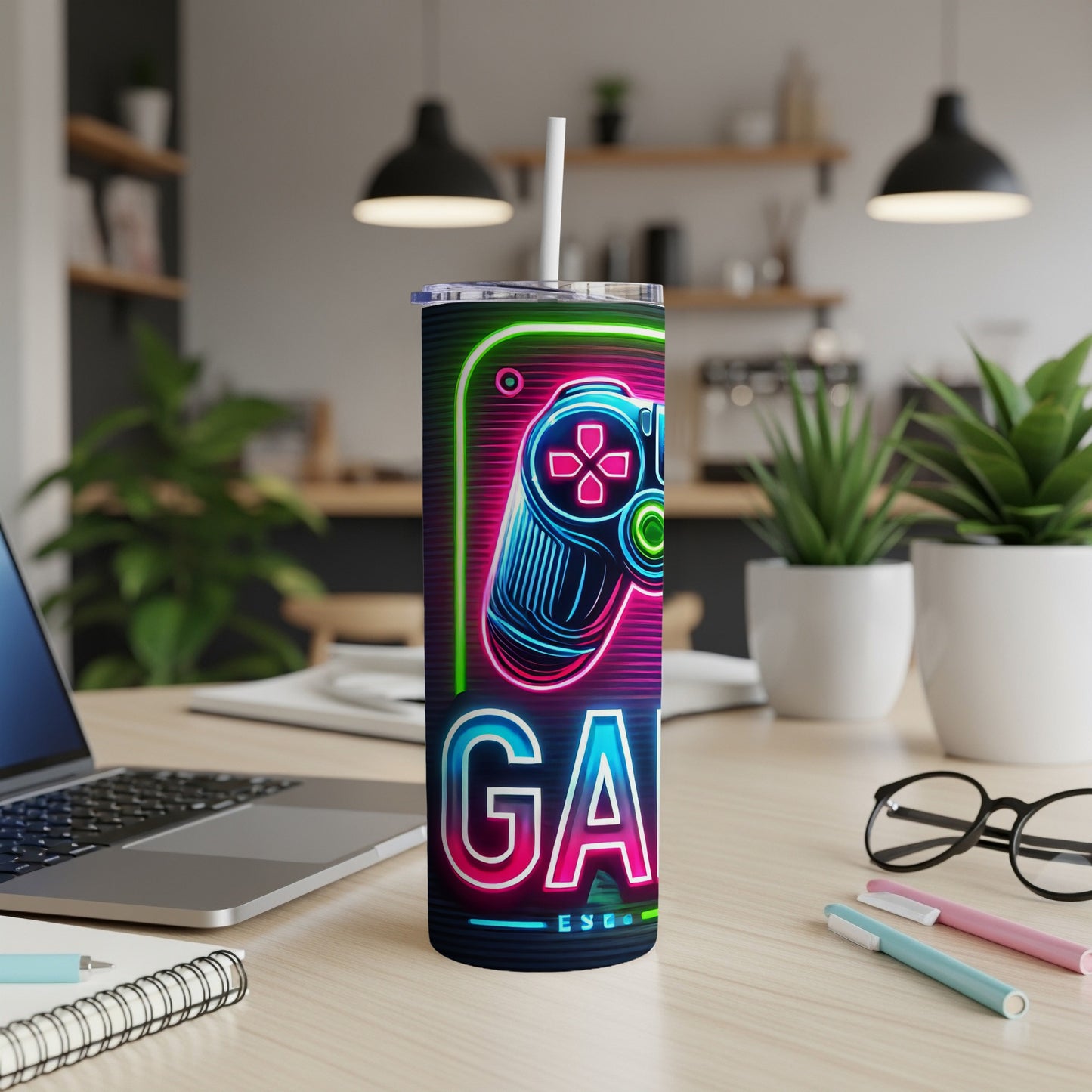 Neon "GAME" text and controller graphic on a skinny tumbler.