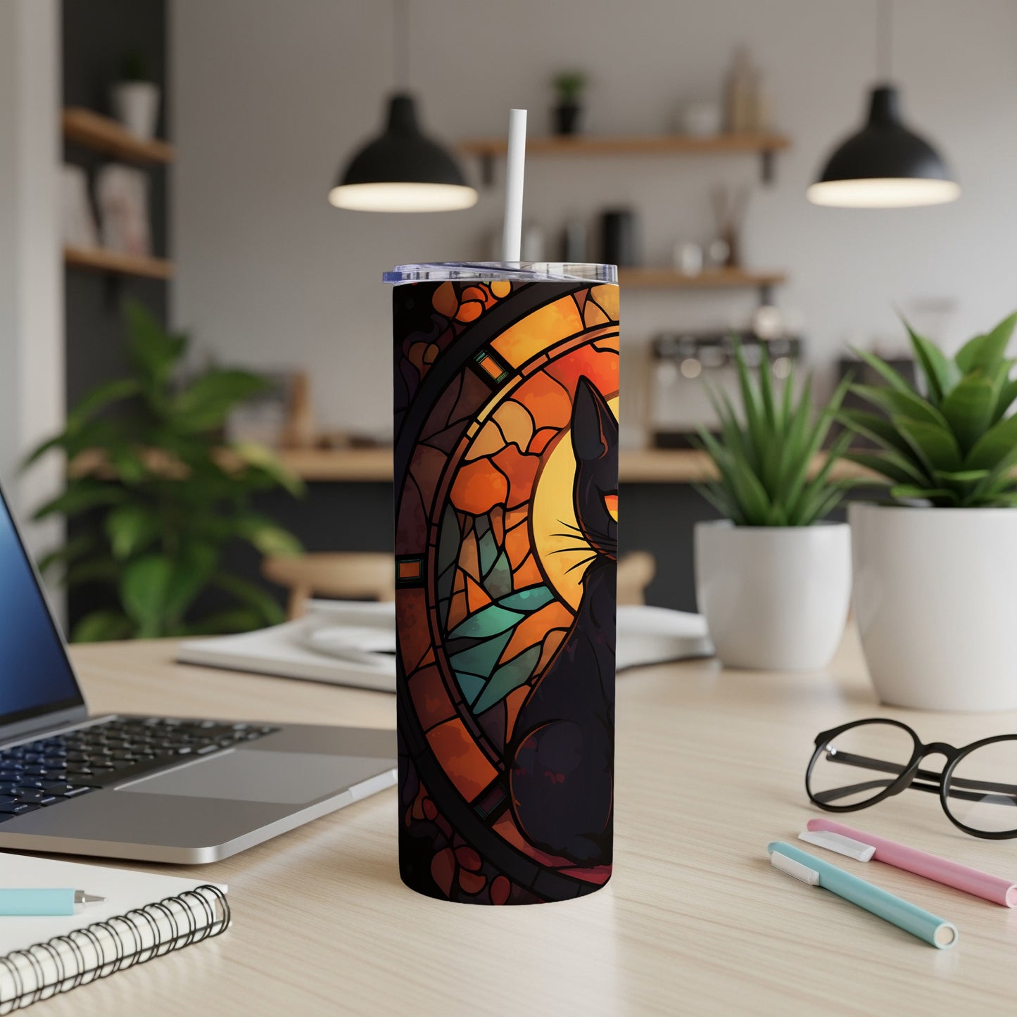 Stained glass style black cat design on a tumbler with a straw.
