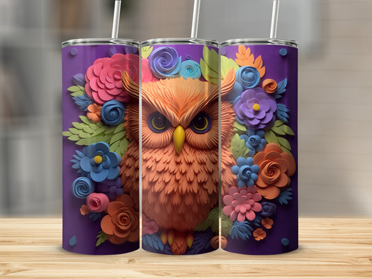 Orange owl with colorful flowers on purple tumbler.