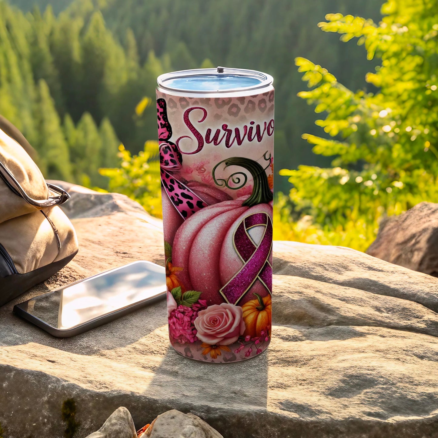 Pink breast cancer awareness tumbler with pumpkins, flowers, and "Survive" text.