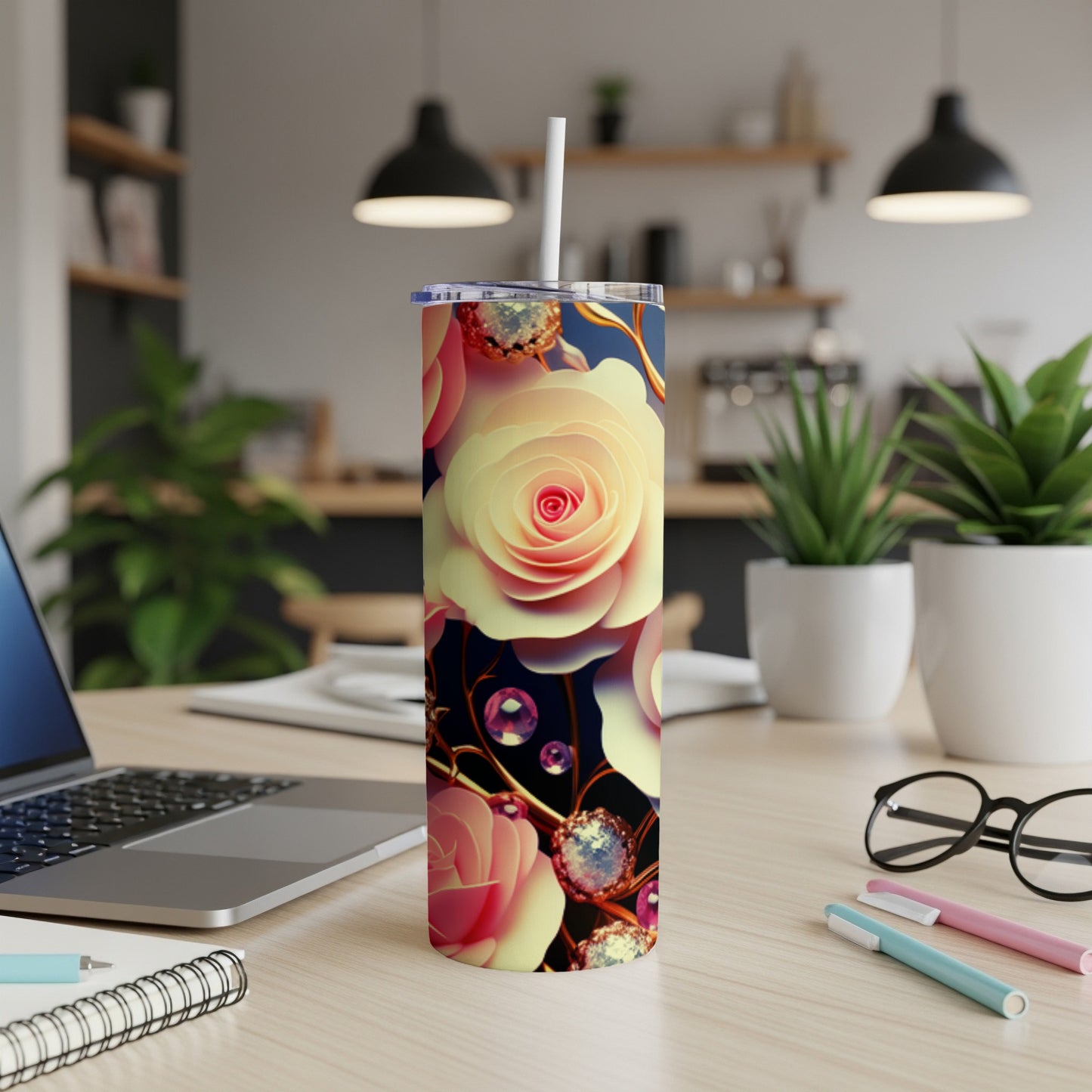 Floral tumbler with pink and yellow roses and gemstone accents.