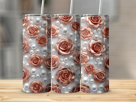 Rose and pearl patterned tumbler on a wooden surface.