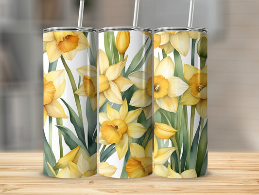 Three tumblers with yellow daffodils and green leaves pattern.