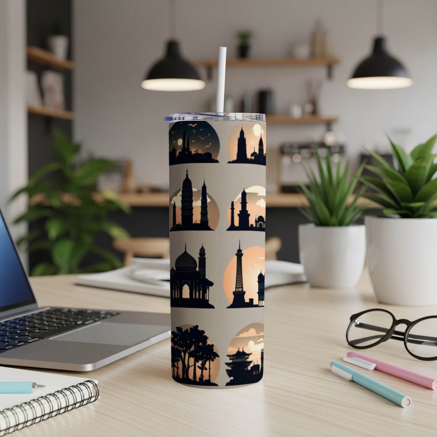 Sleek tumbler with city skyline silhouette designs in a grid.