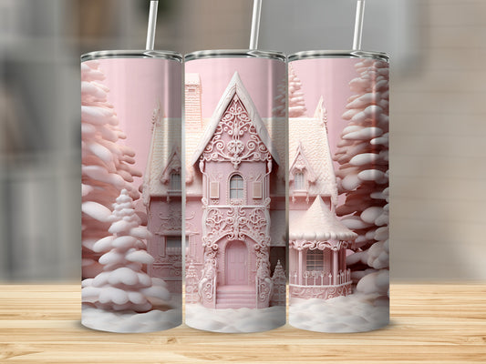 Pink gingerbread house with snow-covered trees on three tumblers.