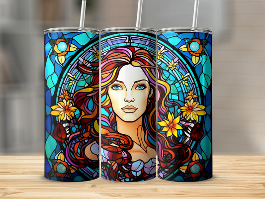 Stained glass tumbler featuring a woman with flowing hair and floral accents.