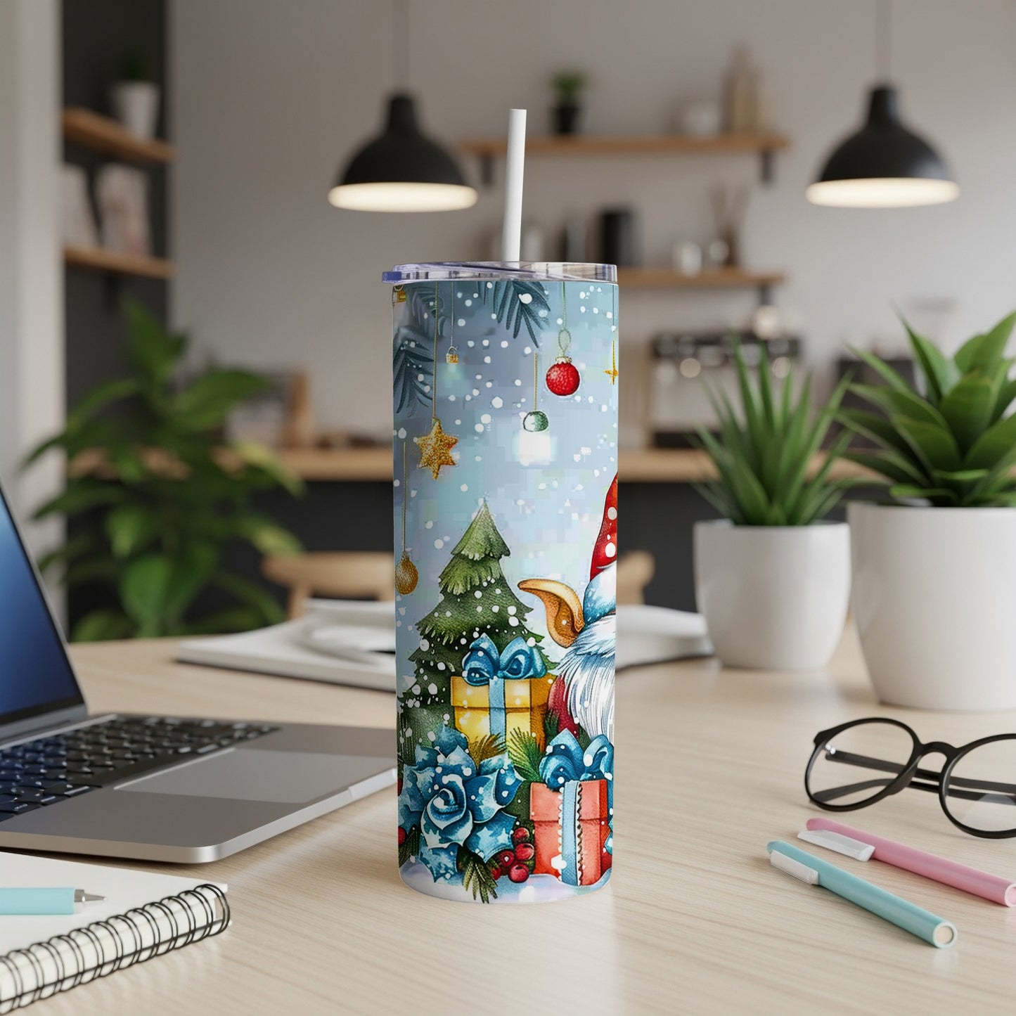 Christmas gnome with gifts and tree design on a skinny tumbler.