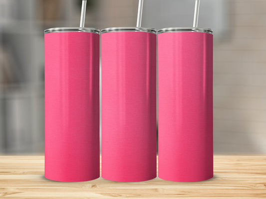 Three pink tumblers with white straws on a wooden surface.