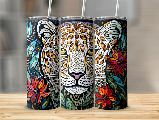 Three tumblers with a stained-glass style leopard face and floral design.