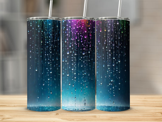 Three tumblers with colorful, falling water droplets against a dark background.