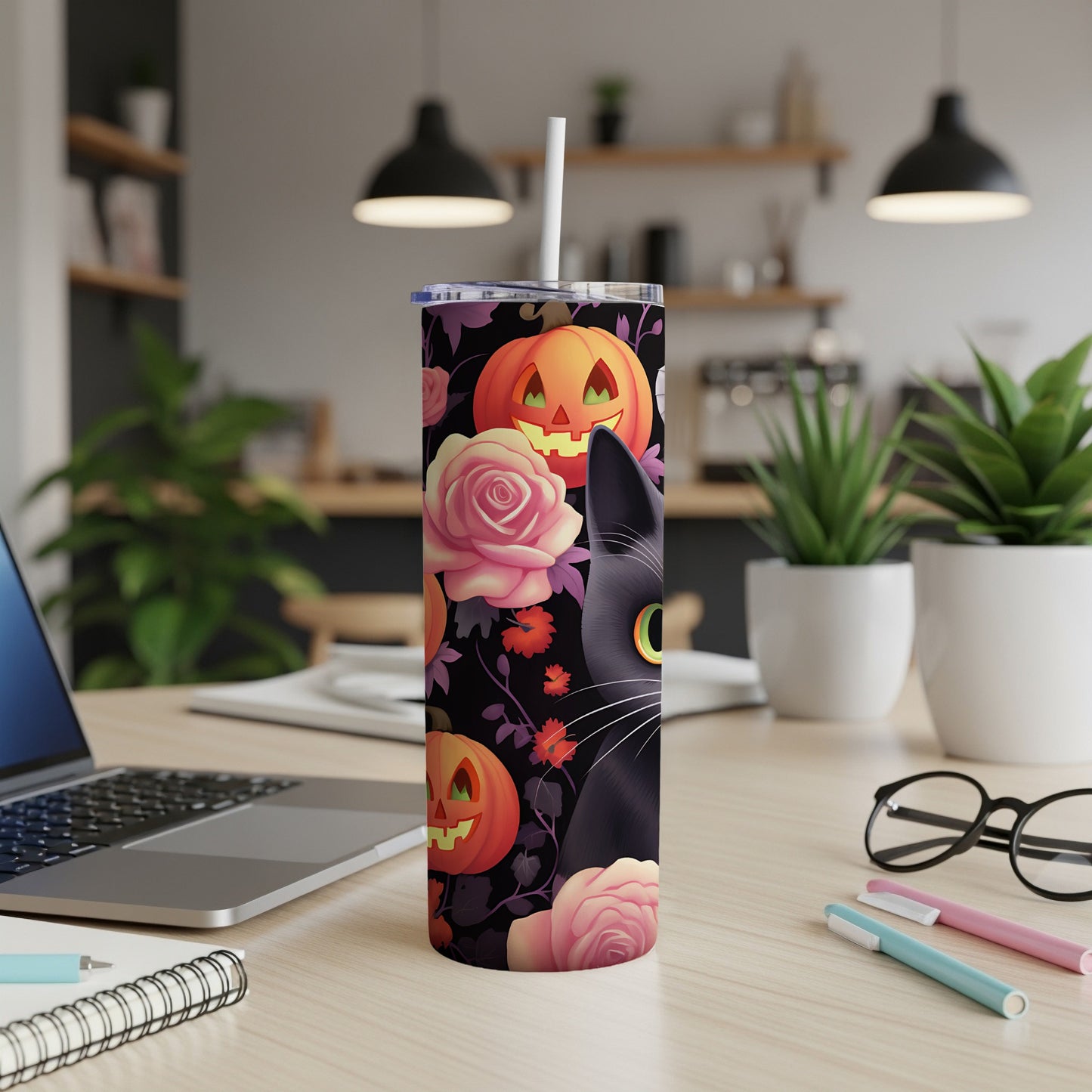 Black cat and jack-o'-lanterns with roses on a Halloween tumbler.