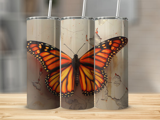 Monarch butterfly on a cracked, weathered background.