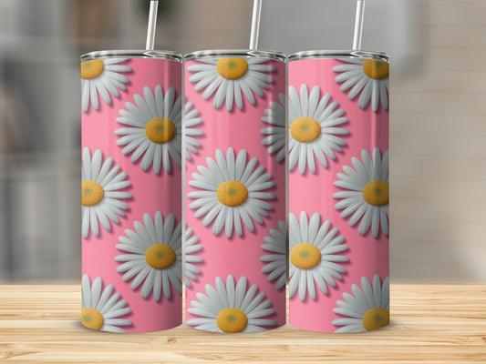 Three tumblers with a repeating daisy pattern on a pink background.