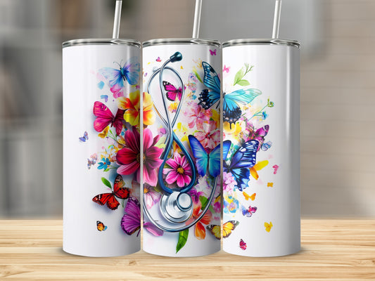 White tumblers adorned with colorful butterflies and floral designs, one with a stethoscope.