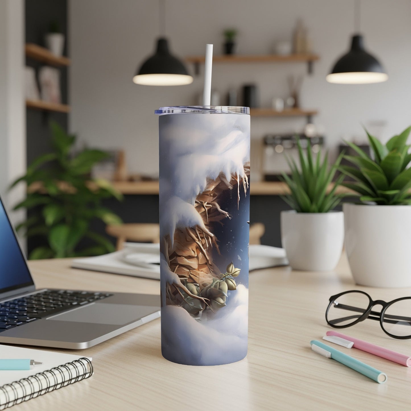 Tall tumbler with a winter scene featuring snow, ice, and a small character.