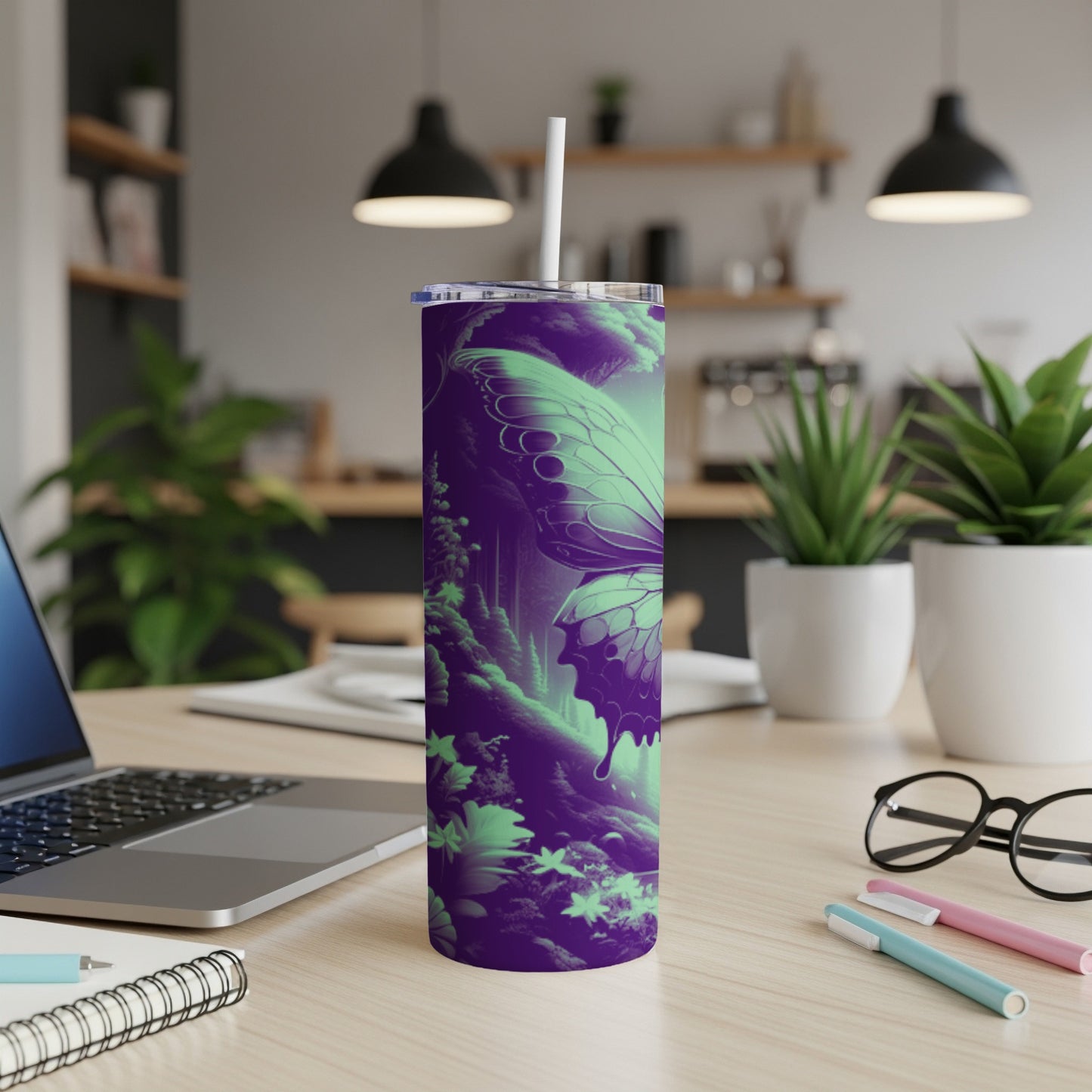 Green butterfly on a purple forest background on a stainless steel tumbler.