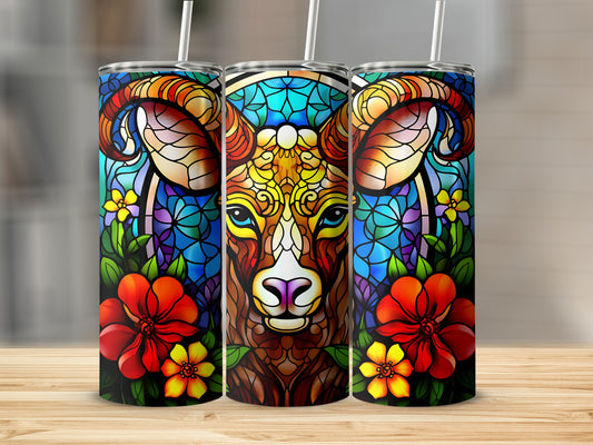 Stained glass style tumbler featuring a ram's head and floral accents.