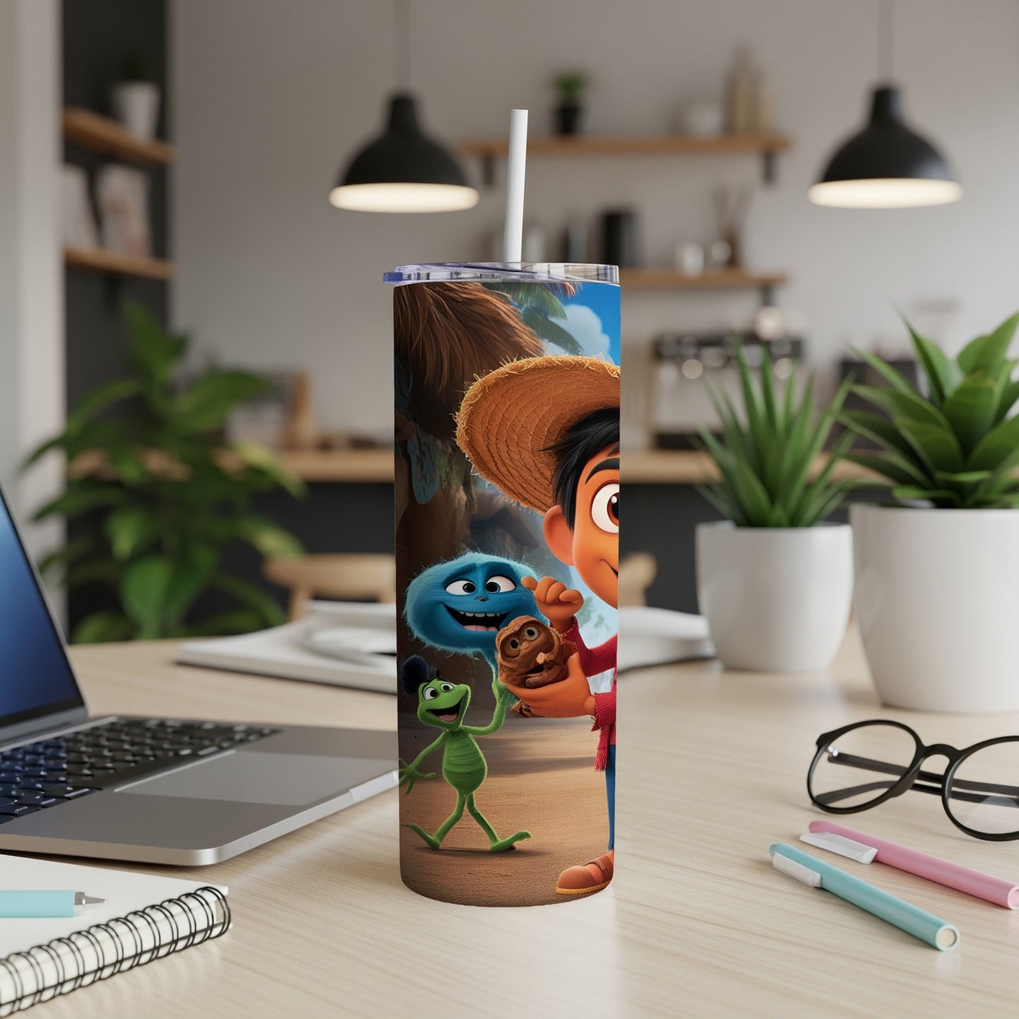 Cartoon characters, a boy, a frog, and a blue creature, on a tumbler.