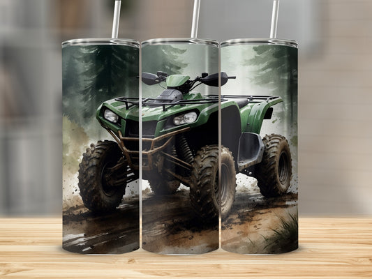 Green ATV on a muddy trail with trees in the background.