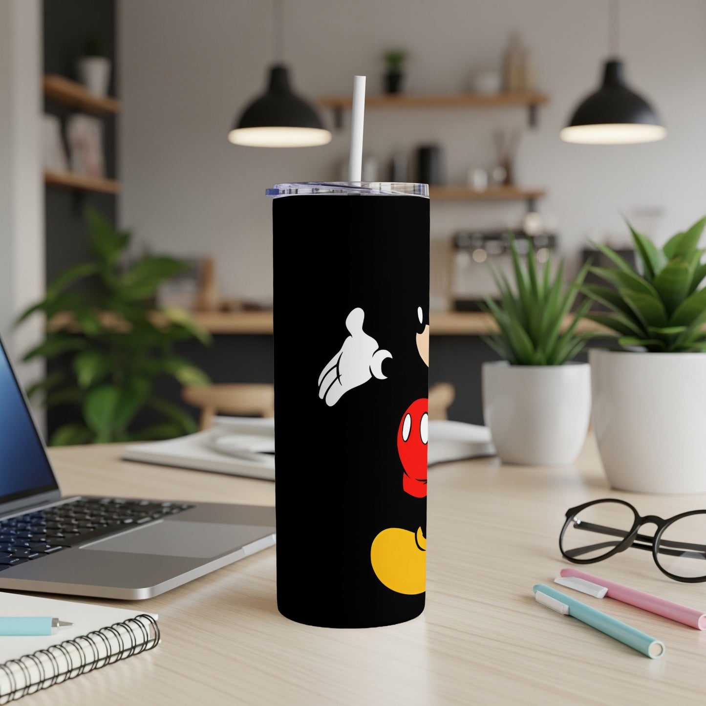 Black tumbler featuring Mickey Mouse graphic and white straw.