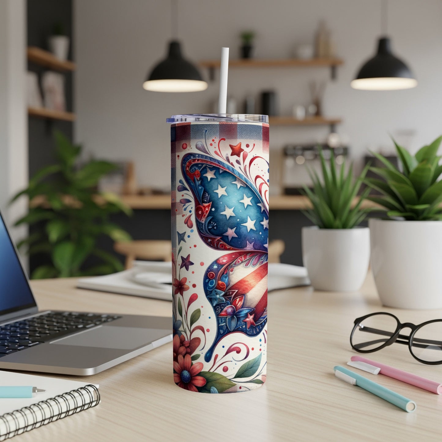 Tumbler with patriotic butterfly design and red plaid lid.
