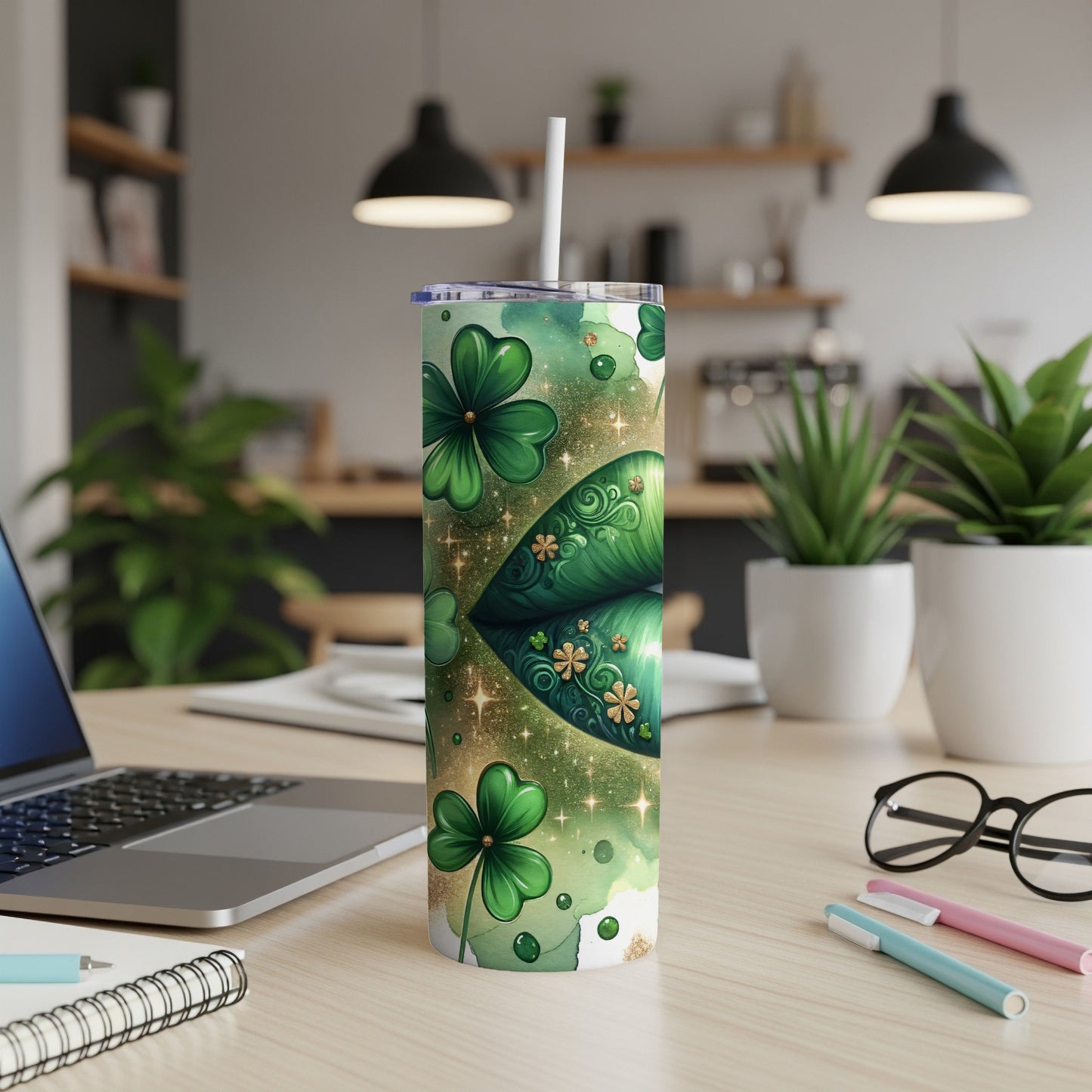 Green clover pattern and glitter lips on a white tumbler with a straw.