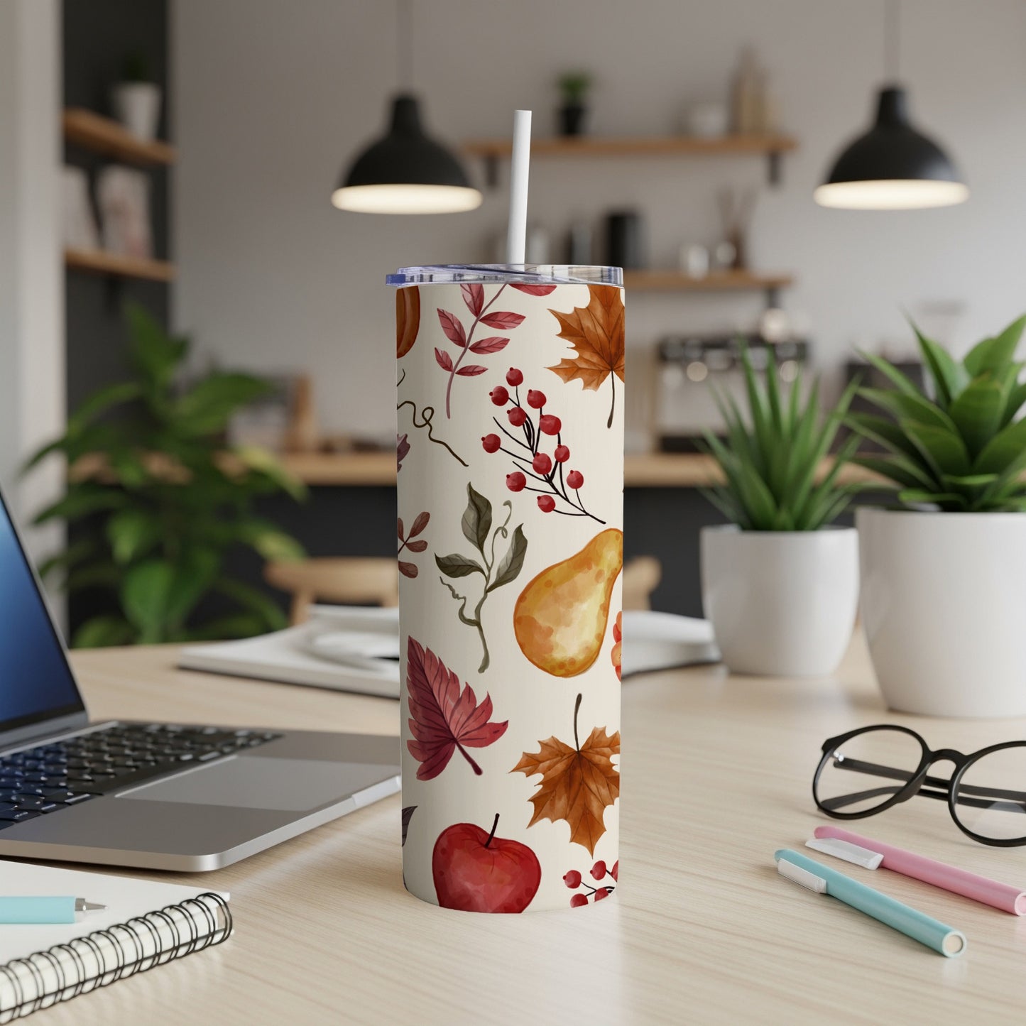 White tumbler with fall leaves, berries, and fruit pattern.