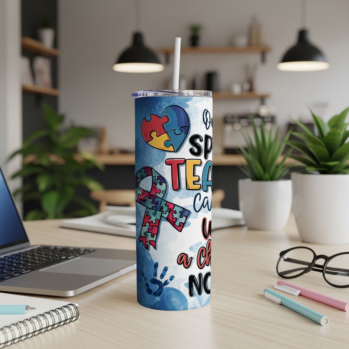 Autism awareness tumbler with puzzle pieces and empowering text.