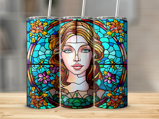 Stained glass tumbler with a portrait of a woman surrounded by flowers.