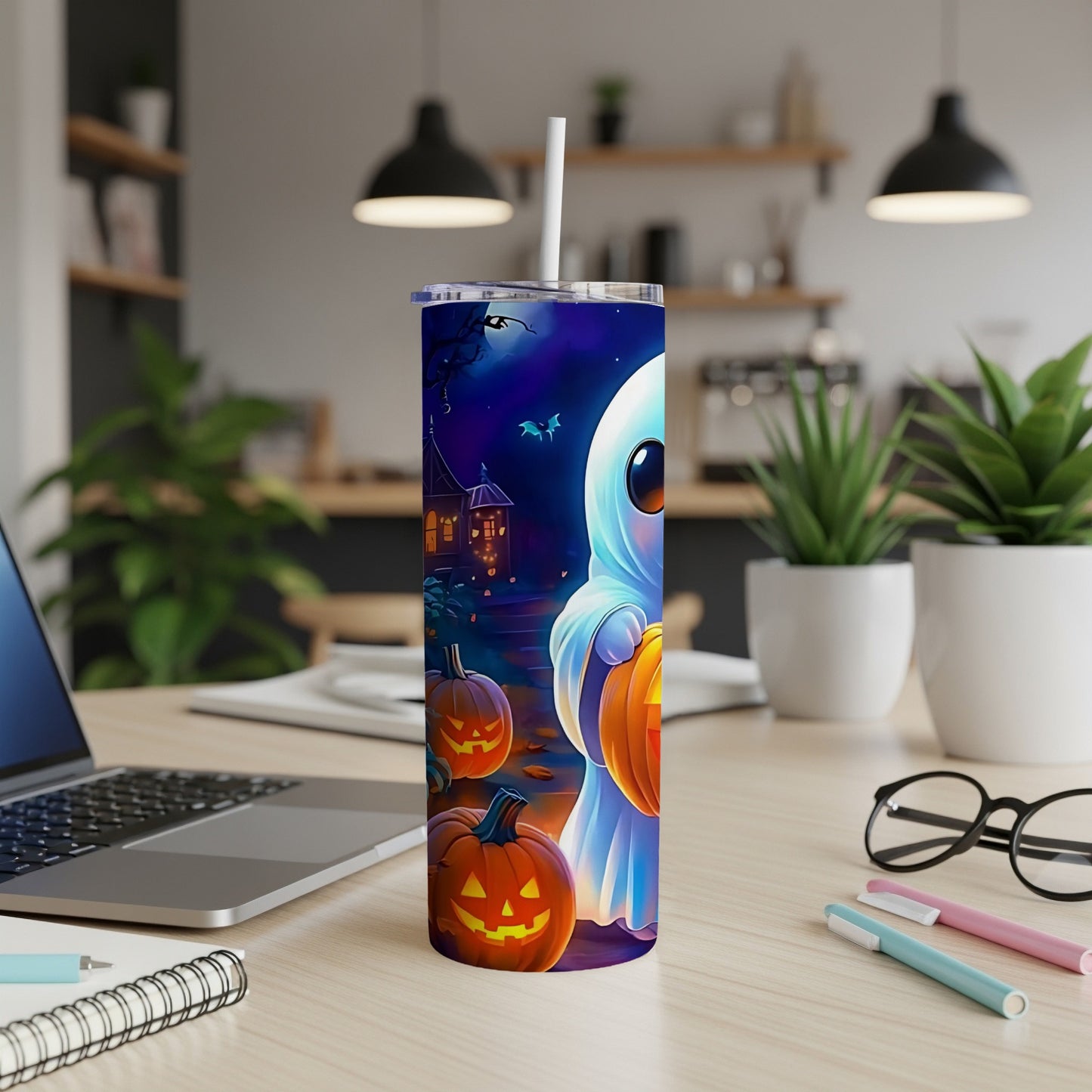 Halloween tumbler with a cute ghost and pumpkins design.