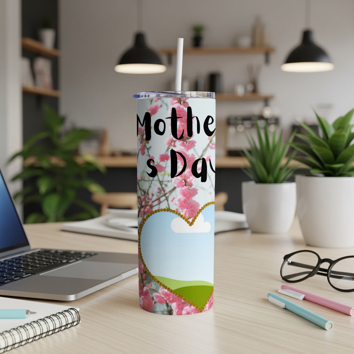 Mother's Day tumbler with pink blossoms and a heart design.