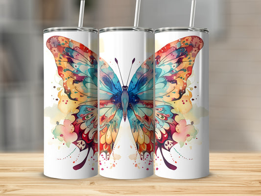 Three tumblers with colorful butterfly watercolor designs on a wooden surface.