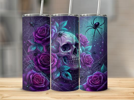 Skull, spiders, and purple roses on a Halloween-themed tumbler.