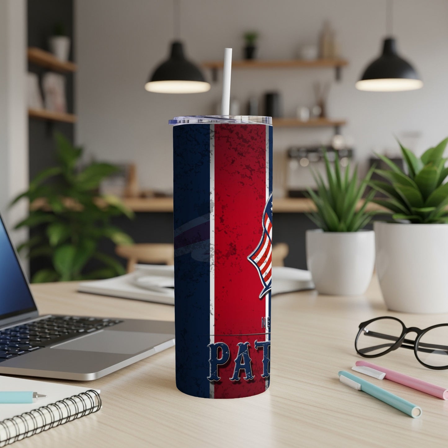 Patriots themed tumbler with distressed red, white, and blue design and text.